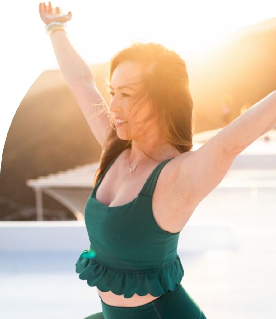 Cece practicing yoga at Aegialis Hotel & Spa, a luxury wellness retreat in Greece